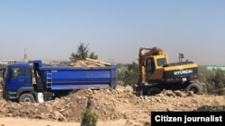 Many houses were razed to the ground to make way for the new palatial palace in Tashkent's Qibray district.