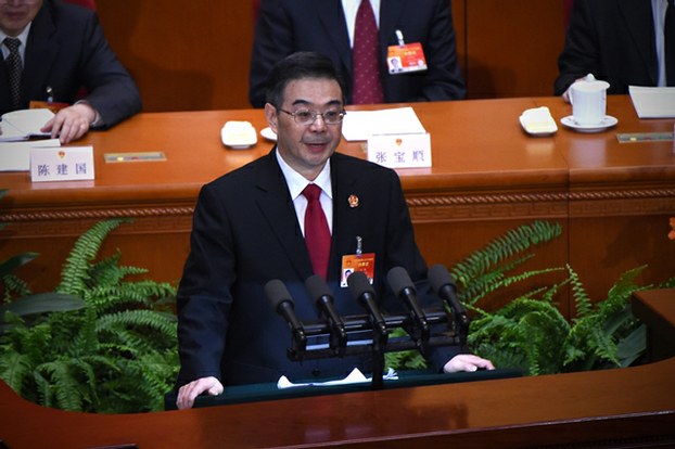 Zhou Qiang, president of the Supreme People's Court of China, delivers his work report to the National People's Congress at the Great Hall of the People in Beijing, March 12, 2015.