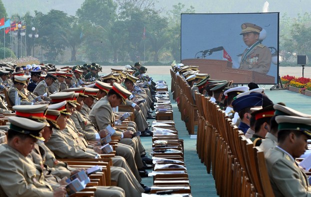Members of the military listen to an address by commander-in-chief Min Aung Hlaing at the Armed Forces Day ceremony in Naypyidaw, March 27, 2013.