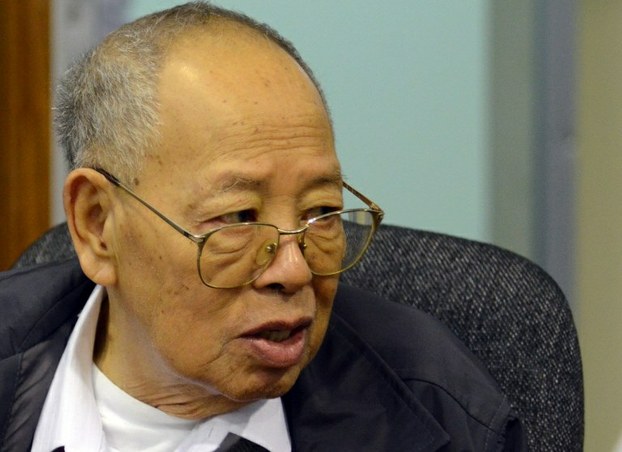 Ieng Sary talks in the courtroom during his trial for war crimes at the Extraordinary Chamber in the Courts of Cambodia (ECCC) in Phnom Penh on March 20, 2012.