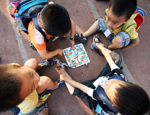 Children play at a special school for children of migrant workers in Fujian province, Sept. 22, 2009.