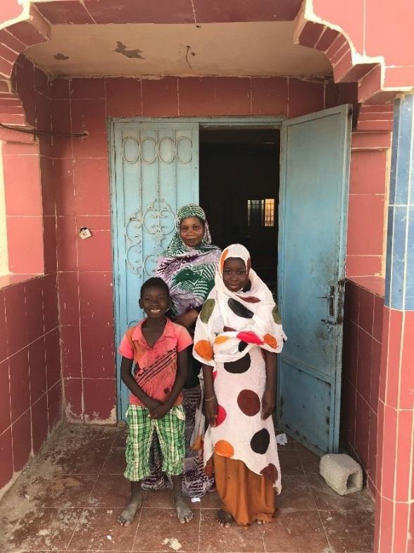 Khaira and her children Tourad and Fatimata who are not permitted to enroll in public school for lack of civil registration, Nouakchott, Mauritania, October 23, 2017.