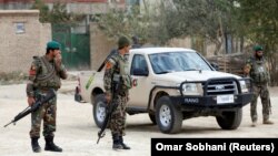 Afghan National Army soldiers keep watch at the site of a suicide attack in Kabul on October 31.