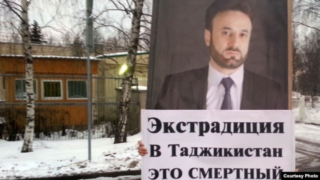 Tajiks protested in December in front of the UAE Embassy in Moscow against the arrest of opposition leader Umarali Quvatov, shown on placard, in Dubai.