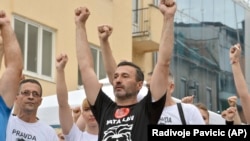 Davor Dragicevic, father of late David Dragicevic, 21, leads a protest in the Bosnian town of Banja Luka.