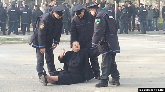 Bosnian police arrest a protester in Tuzla on February 5.