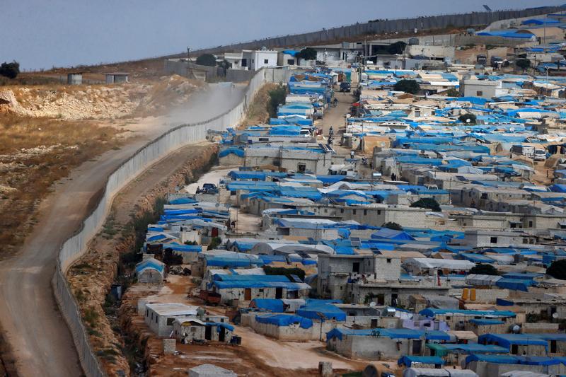 The Atma displaced persons camp on the Syrian side of Turkey's border wall, where on February 6, 2018, during an exchange of fire between Turkish and Kurdish forces, a shell hit killing a girl and injuring seven others.