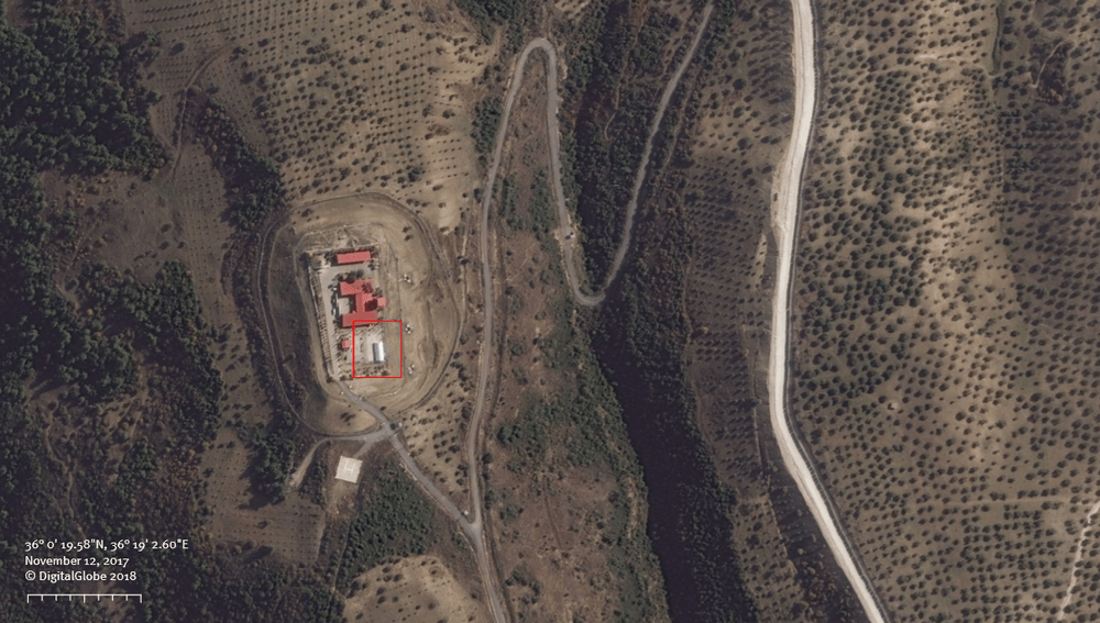 A Turkish security base about 250 meters from the Turkey-Syria border, 2 kilometres south of the Turkish village, Saribük. The base has a basketball court and large tent, as described in statements by deported Syrian asylum seekers who said they were held in such a location before being deported.