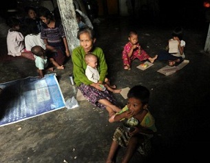 A Rakhine family at a temporary shelter in Sittwe for those displaced by violence, June 15, 2012.