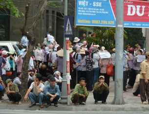 Demonstrators protesting a land dispute gather outside the National Assembly office in Hanoi, April 27, 2011.