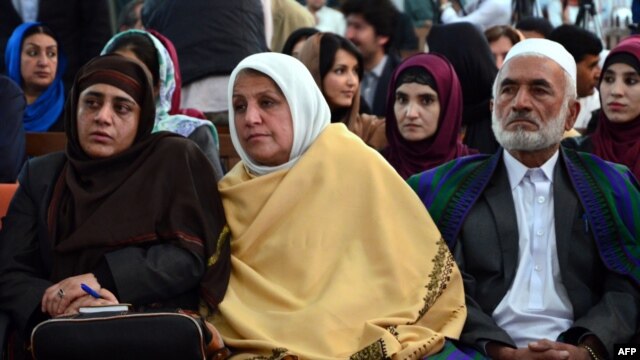 Relatives of 27-year-old Farkhunda, who was beaten to death by a mob, attend a hearing in a court in Kabul, May 6, 2015.