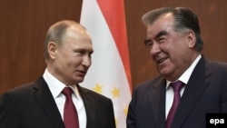 Russian President Vladimir Putin (left) and Tajik President Emomali Rahmon following their talks in Dushanbe on February 27.