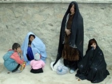 Afghanistan - Afghan women wait outside the main hospital in the western Afghan city of Farah, 03Jan2008