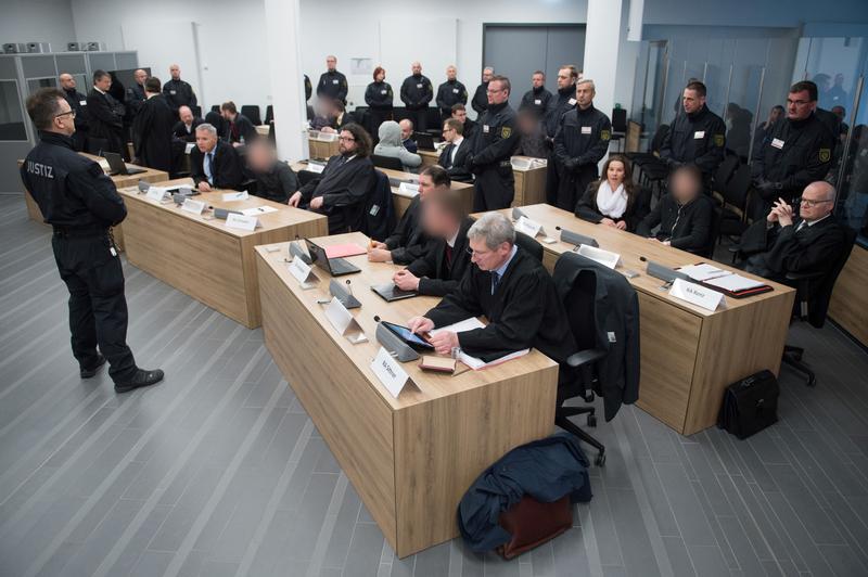 Defendants of the the far-right group 'Gruppe Freital' wait for their verdict in a courtroom in Dresden, Germany, March 7, 2018.