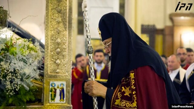 Georgian Patriarch Ilia II leading a midnight Christmas service at the Holy Trinity Cathedral in Tbilisi on January 7.