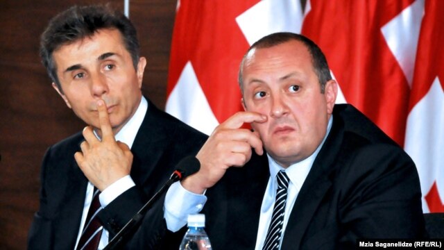 Victorious presidential candidate Giorgi Margvelashvili (right) appeared at an October 28 press conference in Tbilisi with Prime Minister Bidzina Ivanishvili.