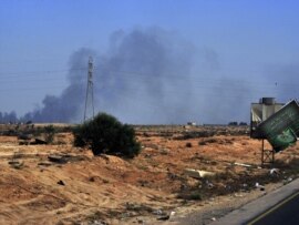 The Red Cross says the situation in Sirte is 'dire' as fighting between interim forces and Qaddafi backers rages.