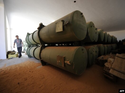 Piles of unidentified ammunition were found stored in a bunker located in the desert some 100 kilometers south of Sirte. Some have expressed concern about all the weapons floating around in the country now after months of conflict.