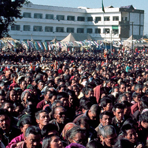 Tibetan pilgrims receive Buddhist teachings at the Kalachakra in Bodhgaya, India, January 2012.