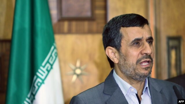 Outgoing Iranian President Mahmud Ahmadinejad speaks at a press conference in Baghdad on July 18.