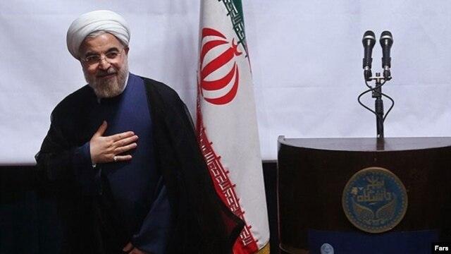Iranian President Hassan Rohani speaks to Tehran University students and professors in Tehran on October 14.