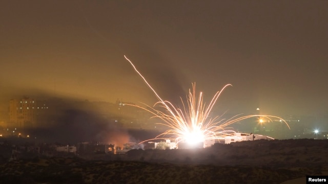 An Israeli rocket is fired into the northern Gaza Strip on July 18.