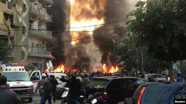 Fire and smoke billows from the site of an explosion in Beirut's southern suburbs on January 2.