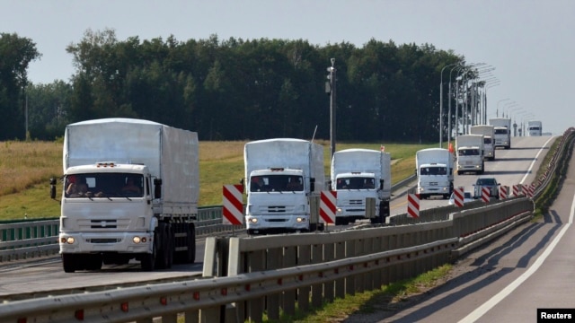 The Russian convoy of trucks carrying aid heads toward Ukraine.