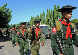Burmese military troop reinforcements arrive in Sittwe, Oct. 31, 2012.