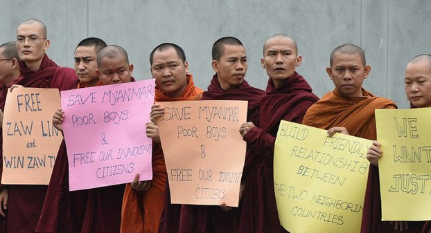 Buddhist monks from Myanmar protest outside the Thai embassy in Colombo, Sri Lanka, Dec. 28, 2015.