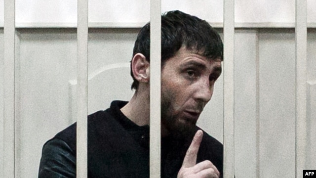 Zaur Dadayev, charged with the murder of Russian opposition figure Boris Nemtsov, speaks inside a defendants' cage at the Basmanny district court in Moscow on March 8.