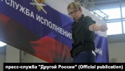 Olga Shalina cut her veins at the the Interpolitekh exhibition of police and military equipment in Moscow on October 25.