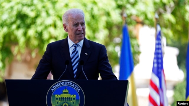 U.S. Vice President Joe Biden addresses a joint media briefing with Romanian President Traian Basescu in Bucharest on May 21.