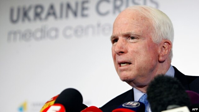 U.S. Senator John McCain speaks at a press conference in Kyiv during a previous visit in September 2014.