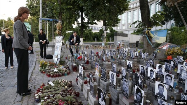 United States Ambassador to the United Nations Samantha Power visits a memorial in Kyiv to the so-called 'Heavenly Hundred,' who were killed during unrest in 2014 that eventually led to the ouster of former Ukrainian President Viktor Yanukovych.