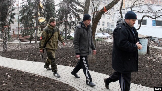 Ukrainian prisoners of war being led by pro-Russian rebels in the eastern region of Donetsk on February 18