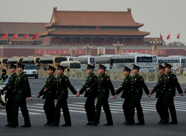 Chinese paramilitary police march near Tiananmen Square in Beijing, March 7, 2014.