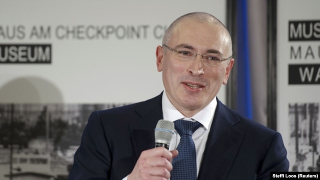 Freed Russian former oil tycoon Mikhail Khodorkovsky speaks at a news conference in the Museum Haus am Checkpoint Charlie in Berlin on December 22.