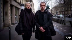 Russian performance artist Pyotr Pavlenski (right) and his partner, Oksana Chaliguina, in Paris in January