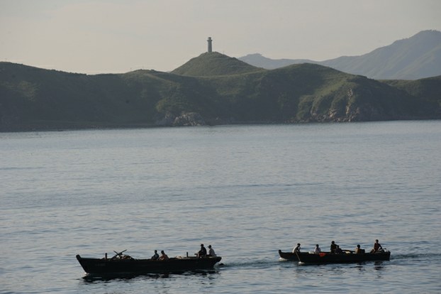 Fishermen go out in their boats in North Korea, Aug. 31, 2011.