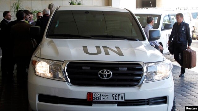 A UN vehicle carrying a chemical weapons investigation team in Damascus (file photo)
