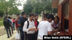 Migrants gathering last year near Belgrade's main bus station