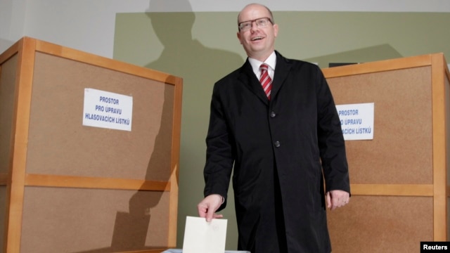 Czech Social Democratic Party leader Bohuslav Sobotka casts his vote at a polling station during an early general election on October 25.