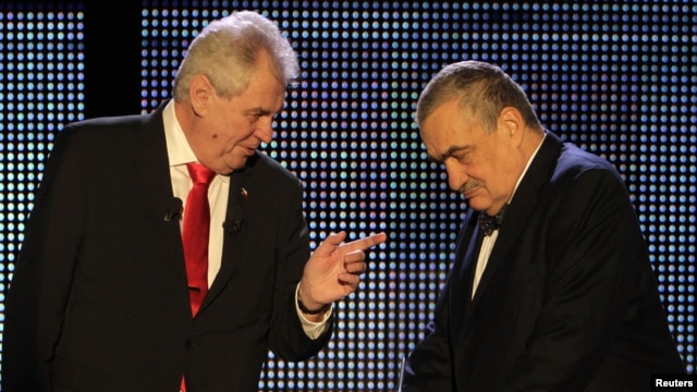 Czech presidential candidates Karel Schwarzenberg (right) and Milos Zeman chat before their final televised debate in Prague on January 24.