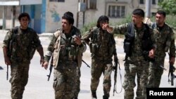 Kurdish fighters from the People's Protection Units (YPG)