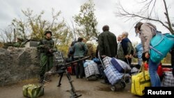 The report says separatist groups controlling parts of the Donetsk and Luhansk regions 'continue to deprive people of their basic rights and of any effective mechanism for redress.'