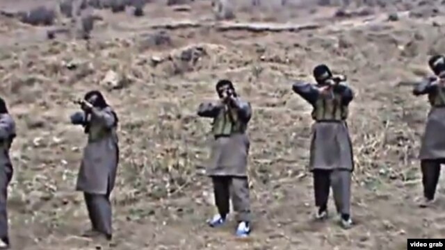 Tajik militants appear in a video purportedly training in Pakistan, where Jamaat Ansarullah was founded in 2006 by former members of the Islamic Movement of Uzbekistan (IMU).