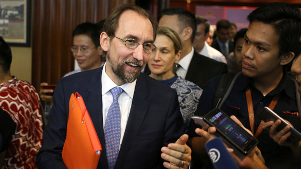 U.N. human rights chief Zeid Ra'ad al-Hussein, center, answers questions from reporters after attending a conference in Jakarta, Monday, Feb. 5, 2018.