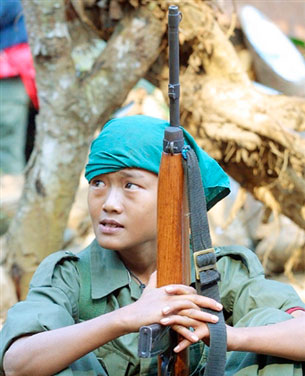 Child soldier in Burma near the border with Thailand, Jan. 31, 2002.