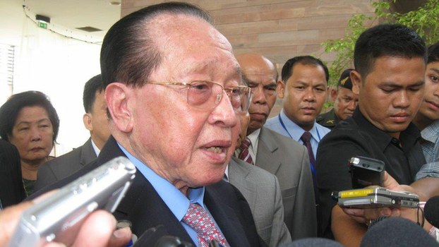 Hor Namhong speaks with reporters upon his return to Cambodia from The Netherlands, April 21, 2013.